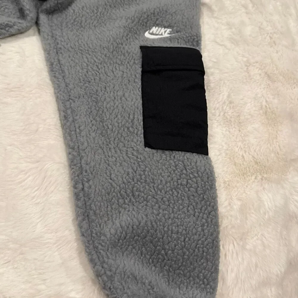 NWT Nike club fleece joggers with cargo pockets gray with black details size XS